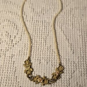 Elegant Gold and Cream Floral Necklace
